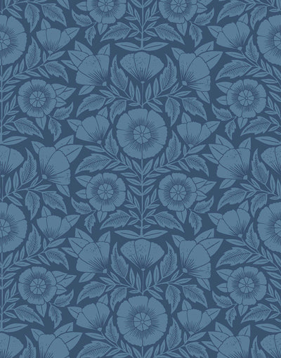 Conservatory wallpaper featuring stylized petals and leaves dervived from a block-print technique was designed by Katharine Watson for Hygge & West. Featuring cornflower blue flowers on a navy blue wallpaper background.